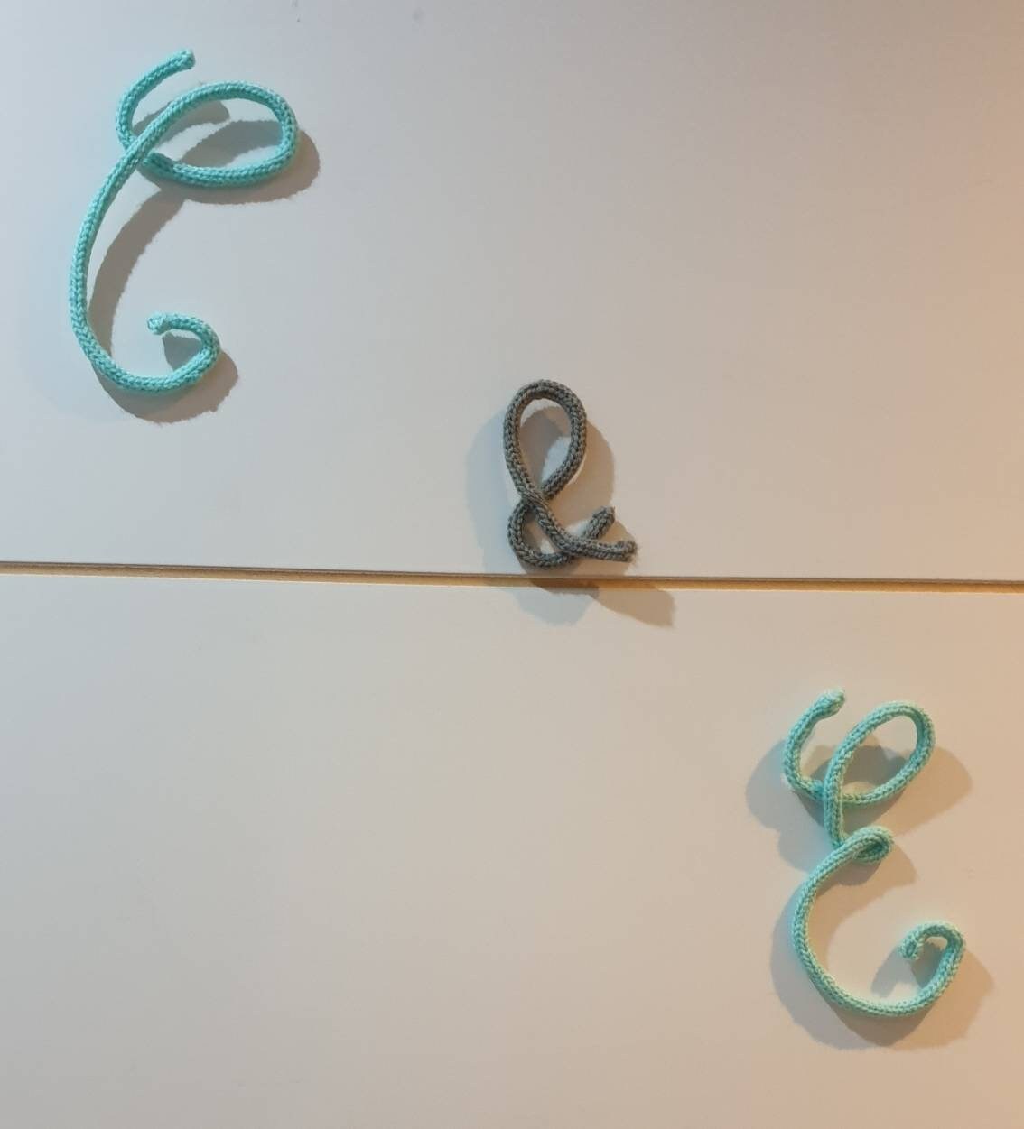 Pompom knitting wall letters